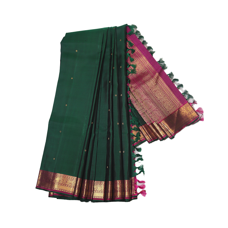 Dark green kancheevaram.