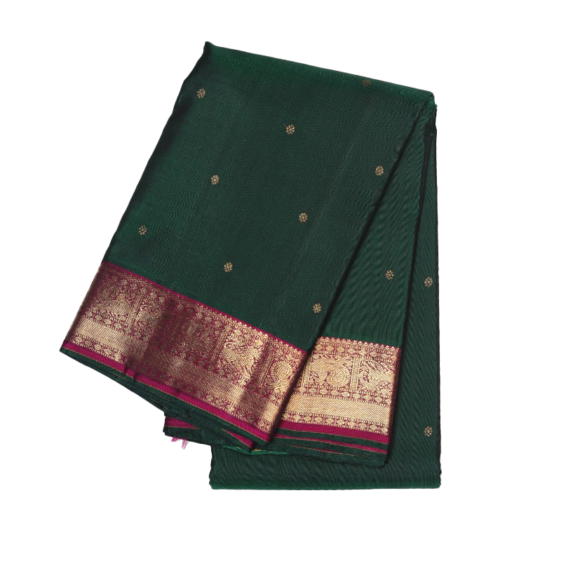 Dark green kancheevaram.